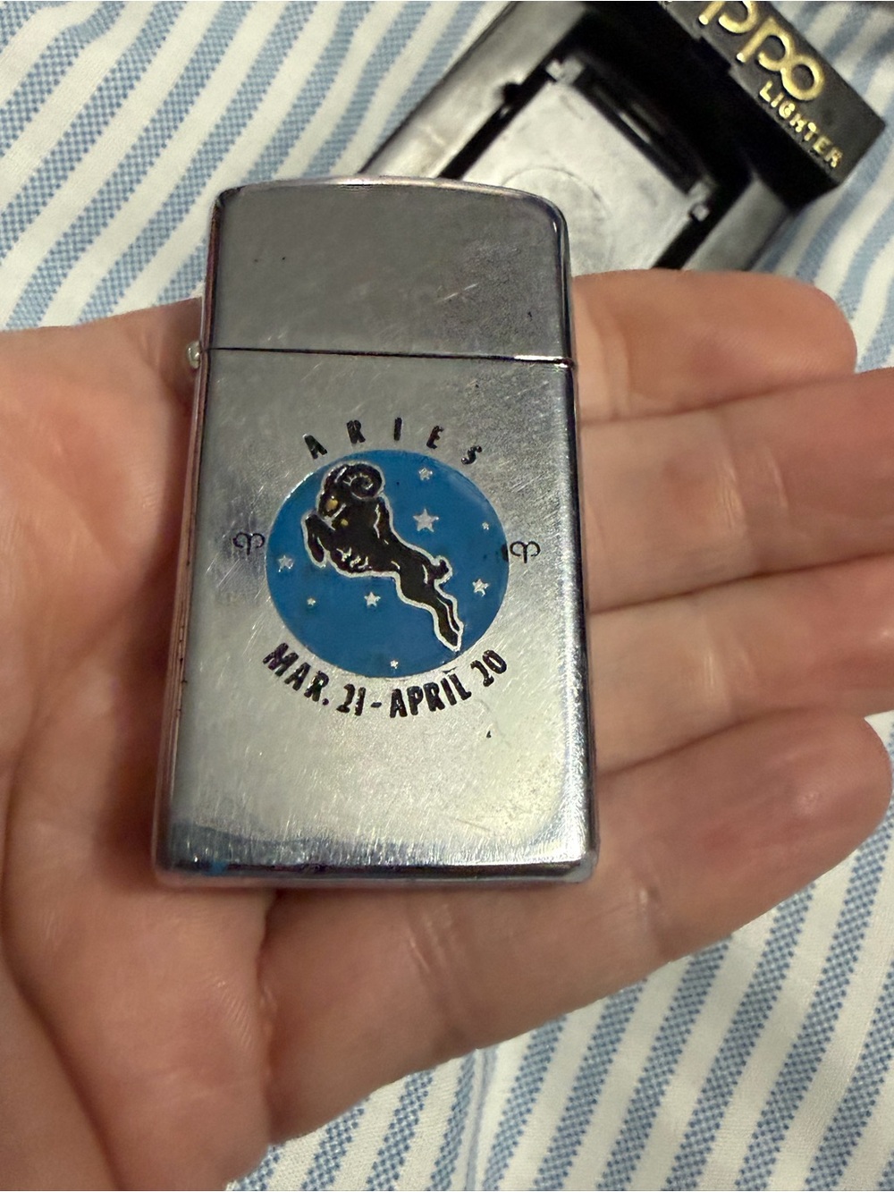 Zippo Aries Metal Lighter in Silver with Blue Emblem